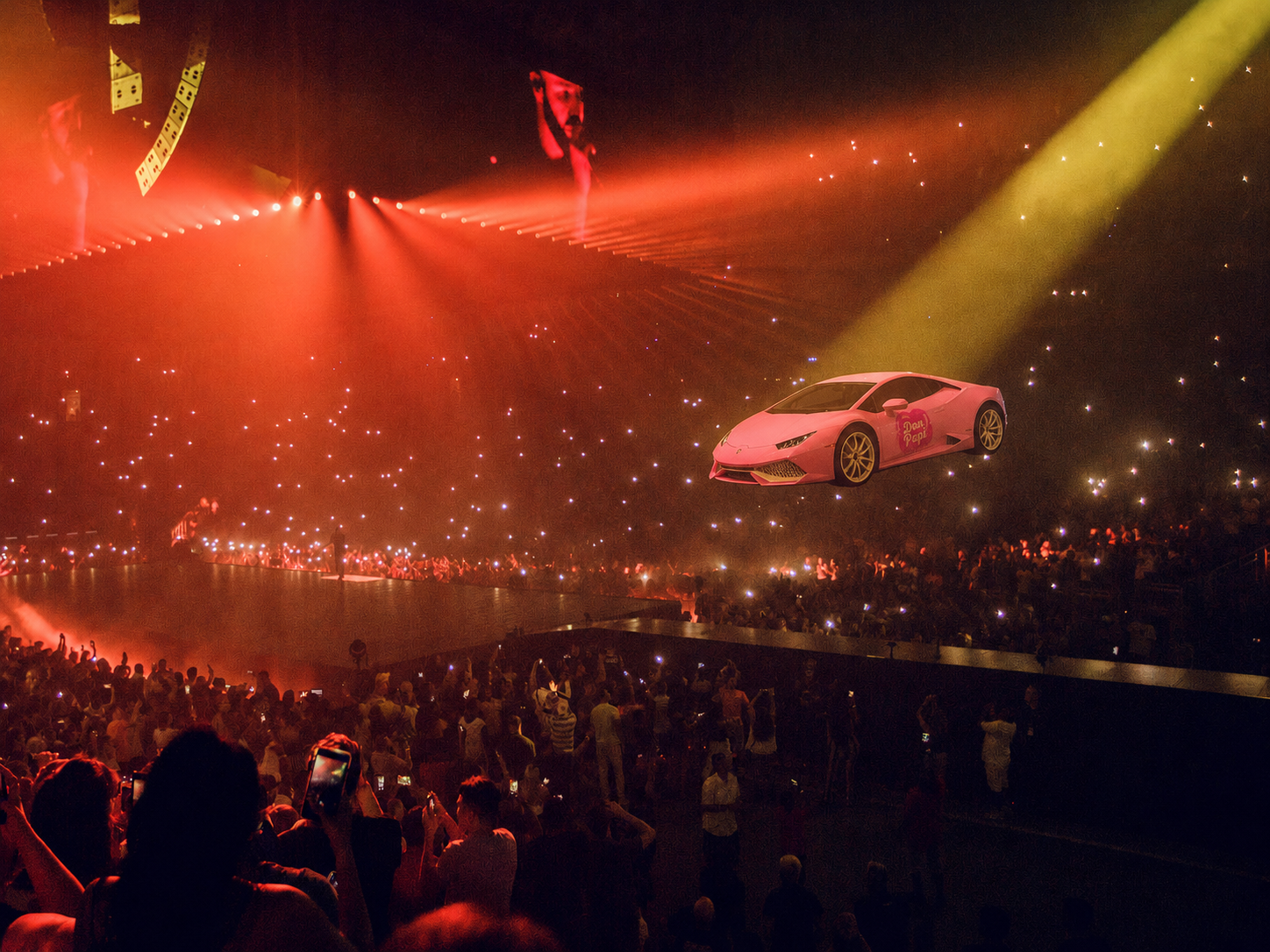 Pink Don Papi Lamborghini flying above the arena crowd